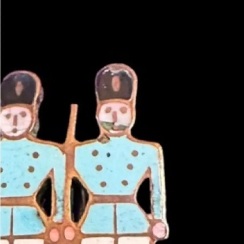 Vintage enamel on gold tone metal soldiers pin brooch